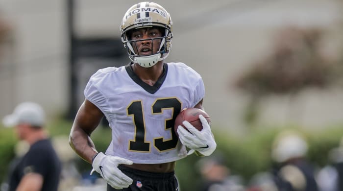 Saints wide receiver Michael Thomas (13) runs during training camp practice.